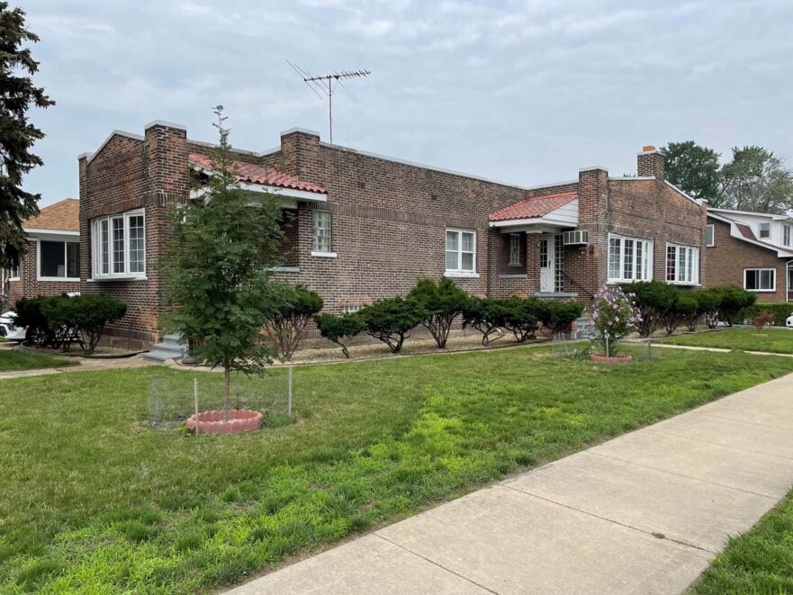 106 A four-plex house in the Craftsman Style.