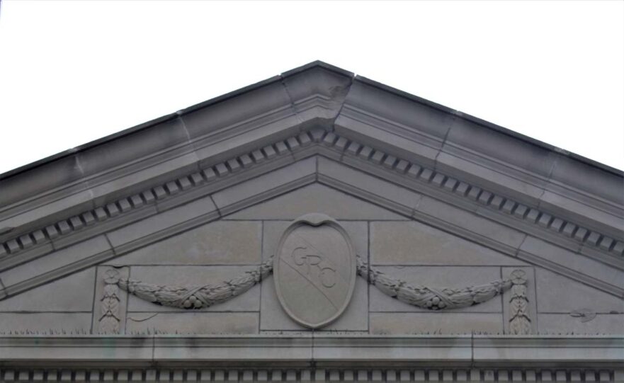 123 Crest over the main entrance of Clark High School circa 2021