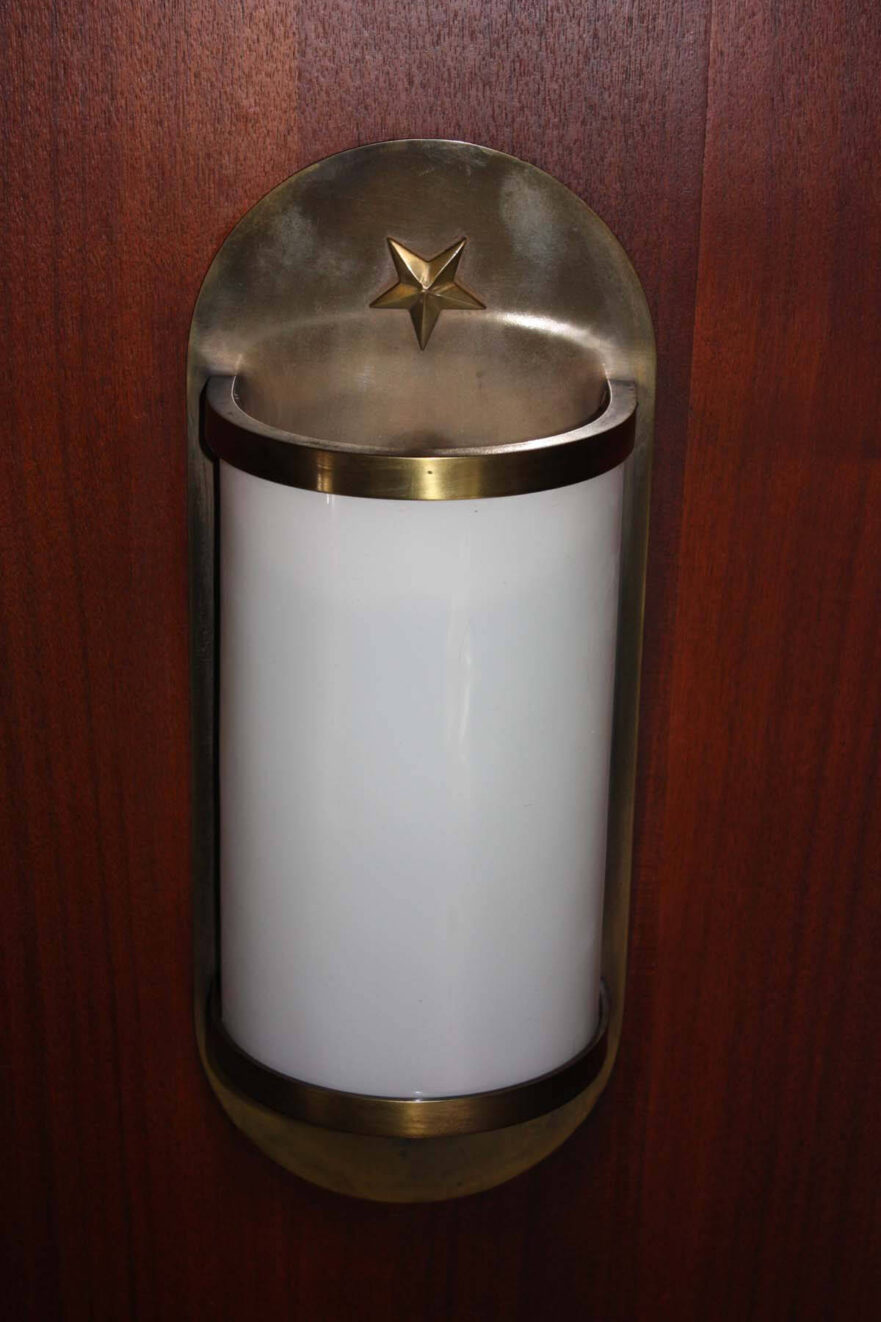 17 Original brass and glass wall sconce in the Mayor’s conference room.