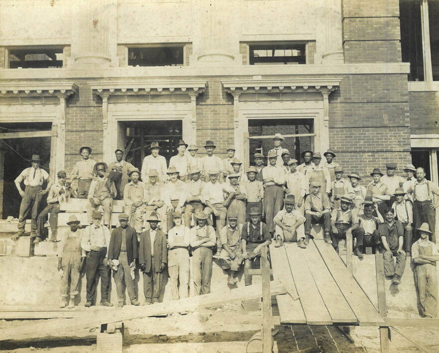 1A Craftsmen in front of practically complete Hammond High School, 1916