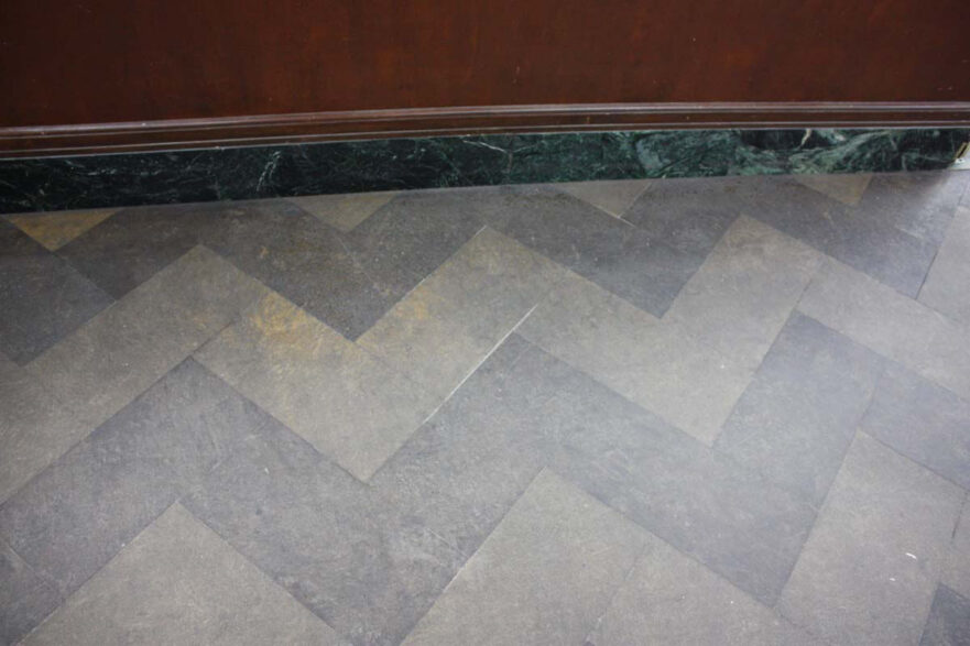 23 Marble courtroom floor laid in a herringbone pattern.