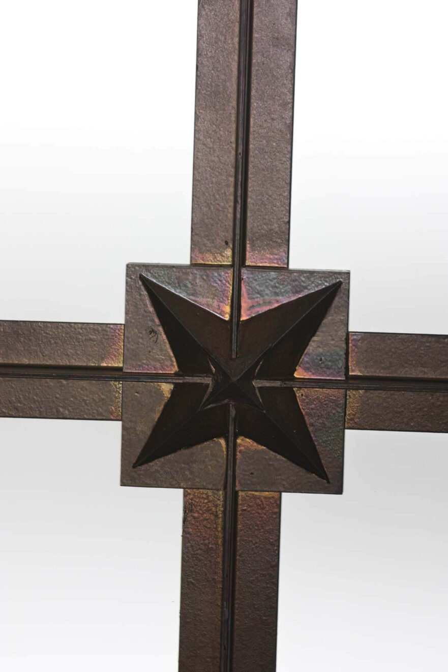 26 Design in the center of an original ceiling light fixture in courtroom.