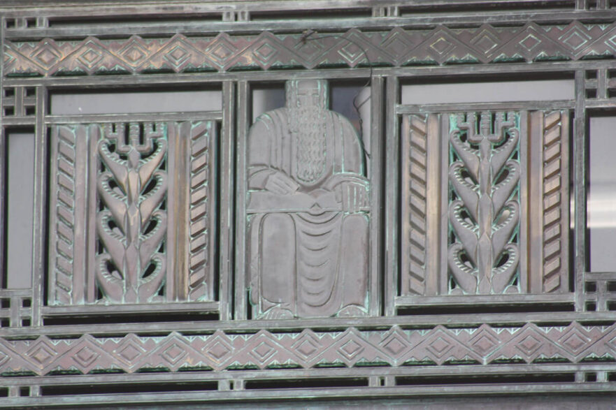 32 Bronze transom grates over the three main doors to City hall sculpted in the Art Deco style, circa 2022.