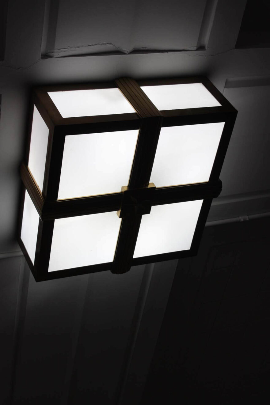 32 Original brass and glass ceiling light fixture in Council Chamber.