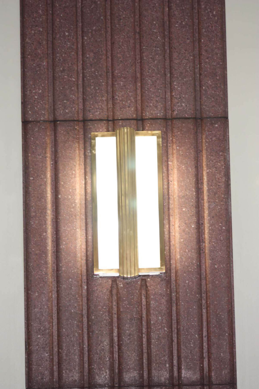 35 Original wall sconce with Art Deco banding in Council Chamber.
