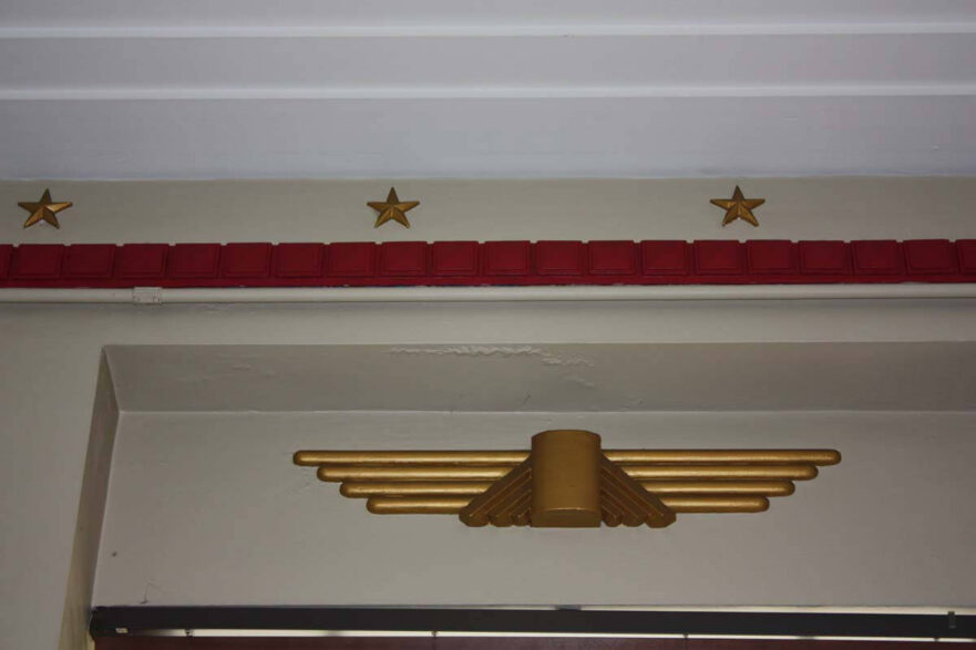 36 Plaster ceiling molding and stylized eagle above the window in the Council Chamber.
