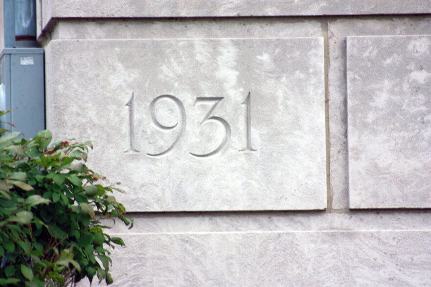 38 Corner stone dedicating the start date of construction in 1931, circa 2022.