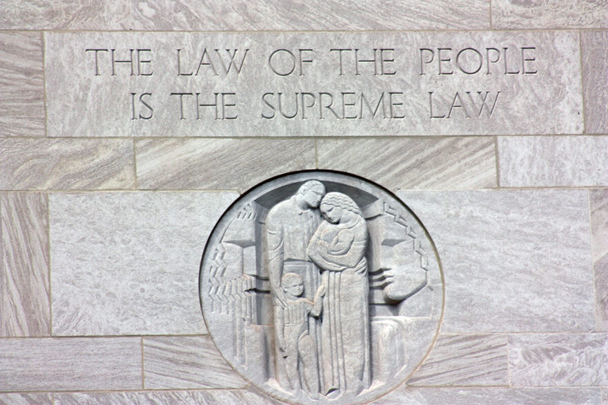 41 Inscription over the east entrance to City Hall, circa 2022.