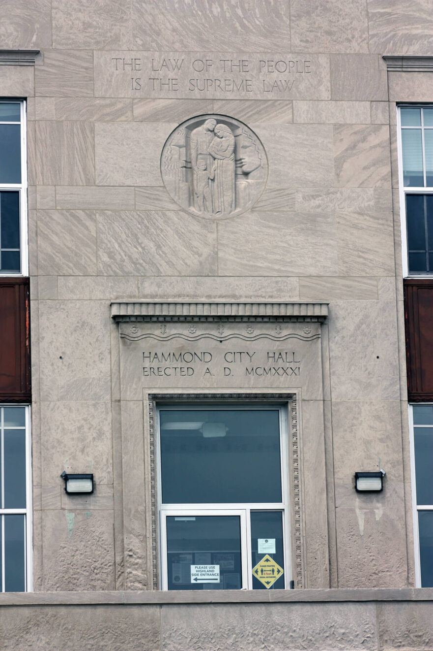 42 East entrance to City Hall, note the carvings around and above the door, circa 2022.
